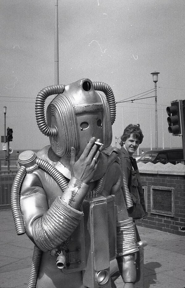 a picture of a cyberman smoking